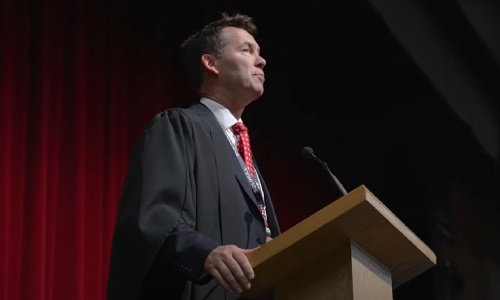 Head of Senior School addressing pupils in assembly